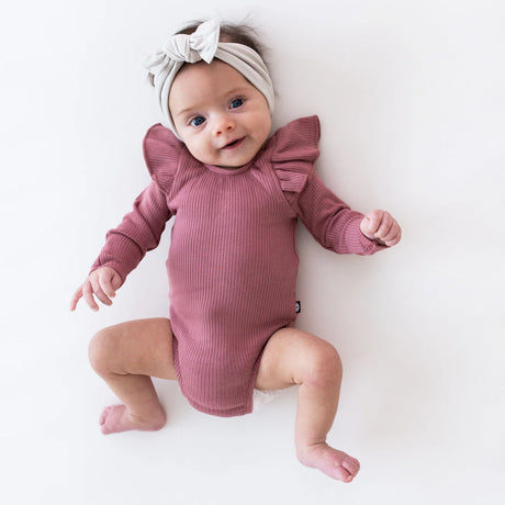 Kyte Baby Ribbed Long Sleeve Ruffle Leotard in Dusty Rose